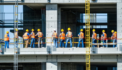 A team of construction professionals working on a modern building project